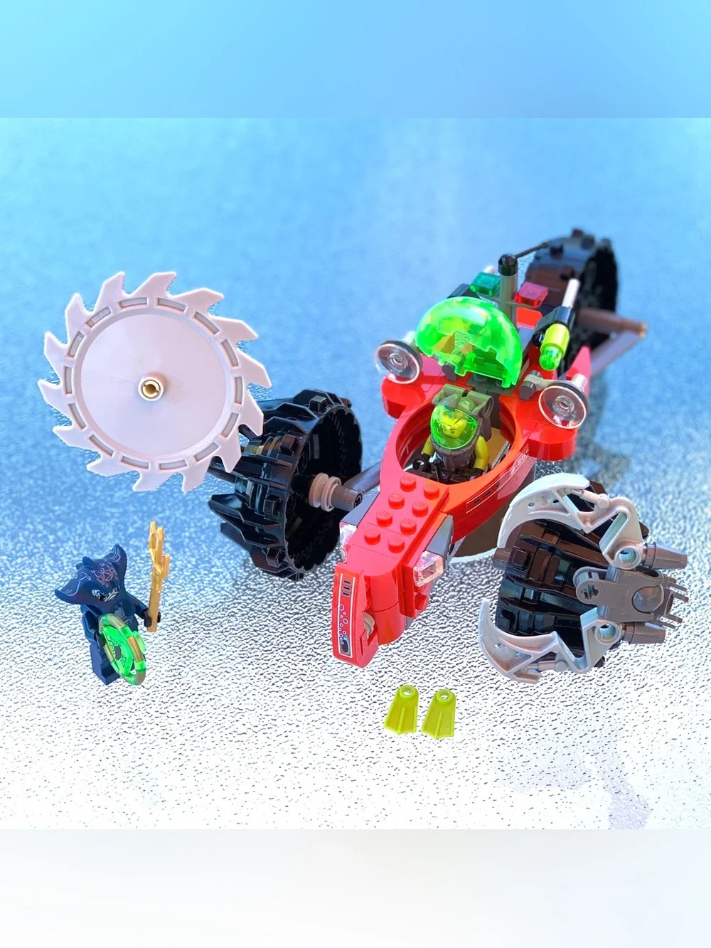 LEGO Atlantis Red Vehicle with Green Cockpit and Black Treads